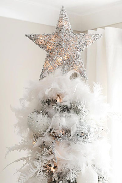 White and silver themed Christmas tree